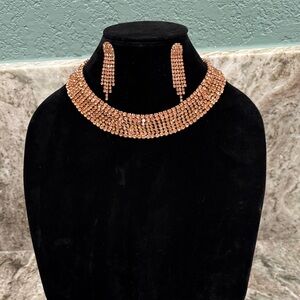 Elegant Faux Rose Gold Necklace and Earring Set. Champagne colored rhinestones!